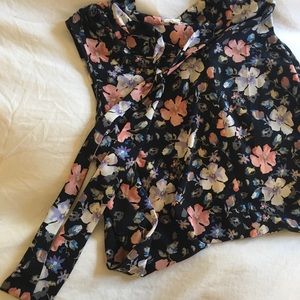 Never worn, without tags floral sleeveless shirt